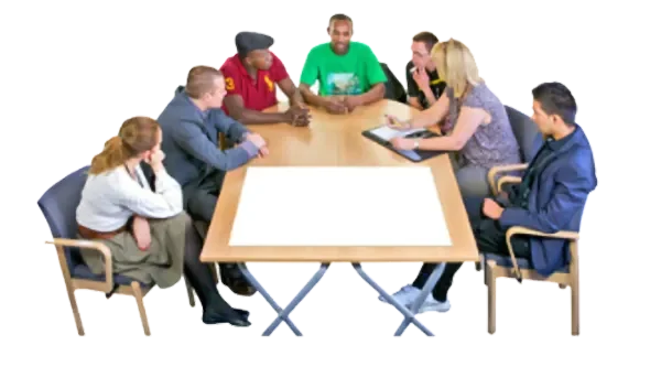 people sitting around a table having a meeting